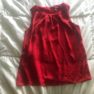 Red sleeveless blouse